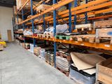 a large warehouse filled with lots of boxes and pallets