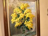 painting of yellow flowers in a glass vase on a beige wall