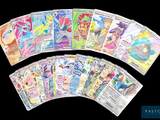 the pokemon cards are lined up in a row on a black background