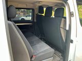 a white van with two seats in the back of it