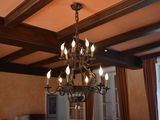 a chandelier that is hanging from the ceiling in a room