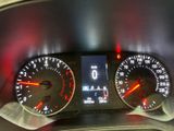 the dashboard of a car with two different gauges on it