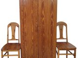 a wooden cabinet and two chairs next to each other
