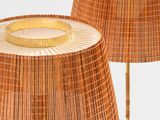 two lamps that are made out of bamboo sticks