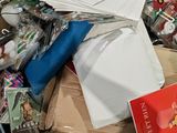 a cardboard box filled with many different items in it