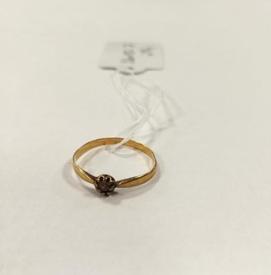 Bague en or jaune 18K(750/1000) sertie d'une petite perle. - Photo 1