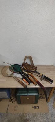 a wooden table with a bunch of tools on top of it