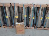 de nombreux rouleaux d'aluminium dans un carton