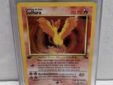 a close up of a pokemon card in a plastic holder