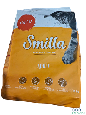 the bag of small dog food is sitting on a white surface