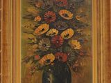une peinture de fleurs dans un vase sur une table