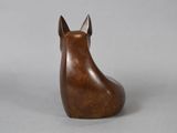 an image of a wooden sculpture of a horse ' s head