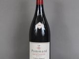 a bottle of wine that is sitting on a table