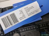 two tags on the back of a pair of jeans