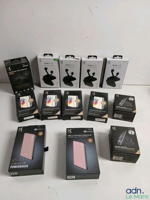 several boxes of cell phones are lined up on a white surface