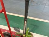 a red hand truck with a black handle and a red hand truck with a black handle and a red hand truck with a black handle