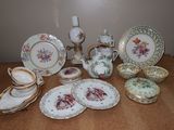 a table with a lot of china on it