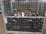 a cart with bottles of wine on it in a warehouse