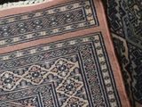 an image of a close up of a rug on a floor