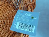 a wicker basket that has a price tag on it