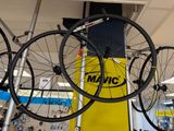 many different types of bikes on display in a store