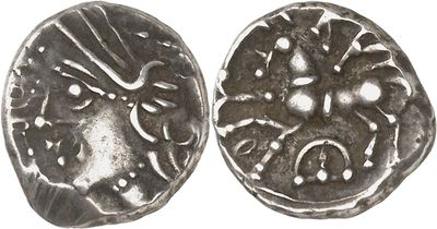 a silver coin with an image of a man and a woman on it
