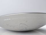 an image of a close up of a silver bowl on a table