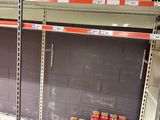 many boxes of food on the shelves in the store