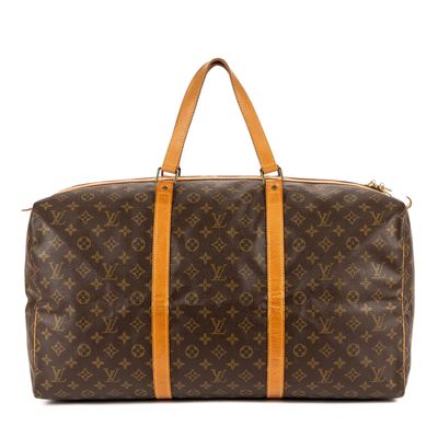 LOUIS VUITTON - SAC de voyage modèle "Sac souple 55" en toil…