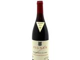 a bottle of wine that is sitting on a table