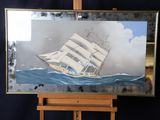 une photo d'un tableau représentant un bateau posé sur un chevalet