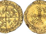 a gold coin with a cross on the front and a cross on the back