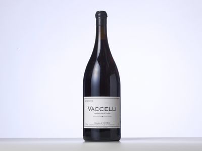a bottle of wine that is sitting on a table