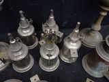 a lot of old metal objects that are on a table