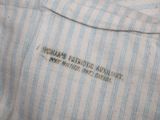 a close up of a shirt with a label on it