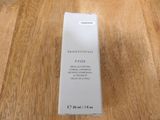 an empty box of skinceutial lotion sitting on a wooden table