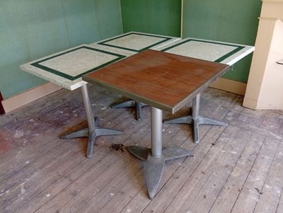 an image of a table in a room with green walls