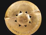 an image of a gold medal with a star of david on it