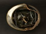 a helmet that has been worn on a black background