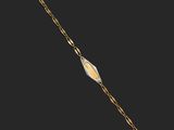 a gold and diamond bracelet, by person