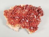 a piece of bread with a red substance on it