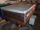 an image of a truck with a tarp on the back of it
