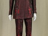 a mannequin dressed in a suit and tie on display