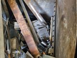 a close up of a saw and some tools inside of a box