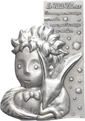 une plaque métallique sur laquelle figure l'image d'une petite fille à cheval