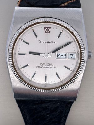 an image of a close up of a wrist watch on a white surface