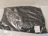 a plastic bag that has a black jacket on it