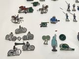 a lot of toy figurines that are on a table