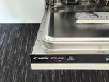 a dishwasher that is sitting in the middle of the floor
