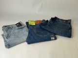 three pairs of men ' s jeans on a white background